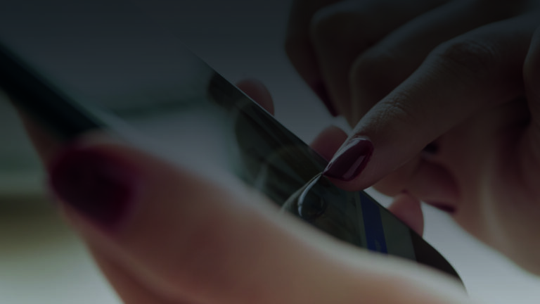 Female hands holding a smartphone