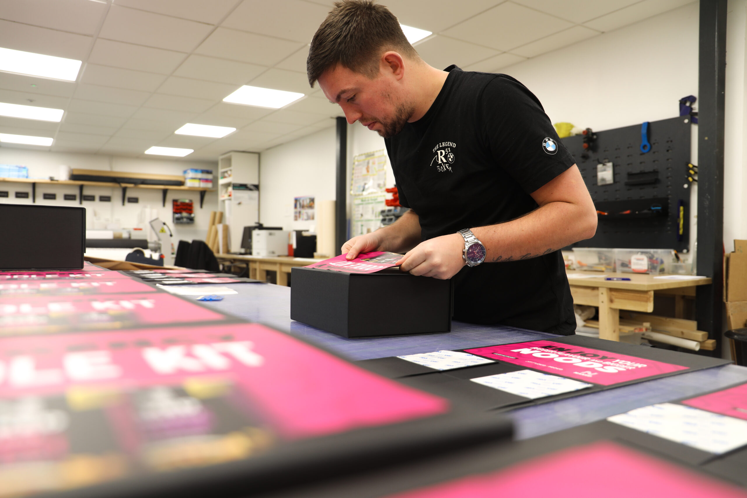 Custom branded labels being applied to PR boxes